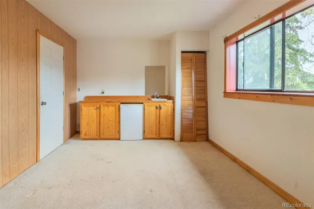 a backyard of a house with seating space