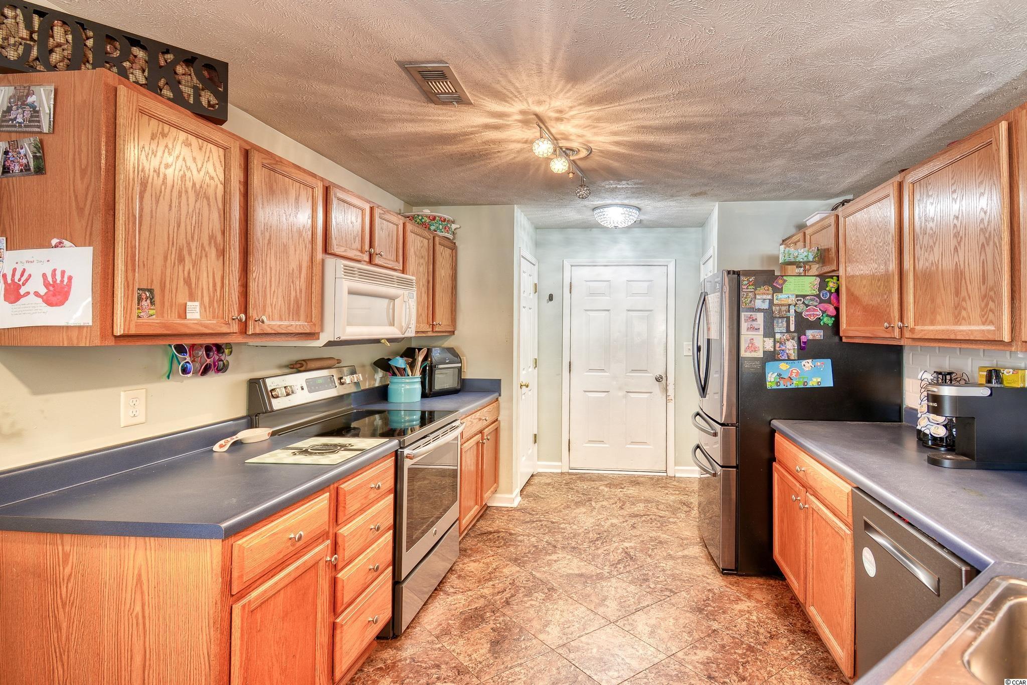 9892 Conifer Lane Murrells Inlet, SC 29576 - Photo 7 of 28 Gallery Image 7