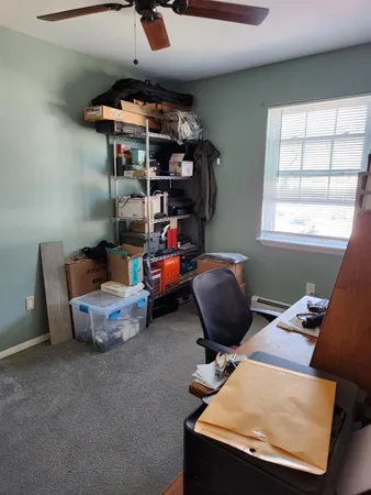 a room with furniture and a window