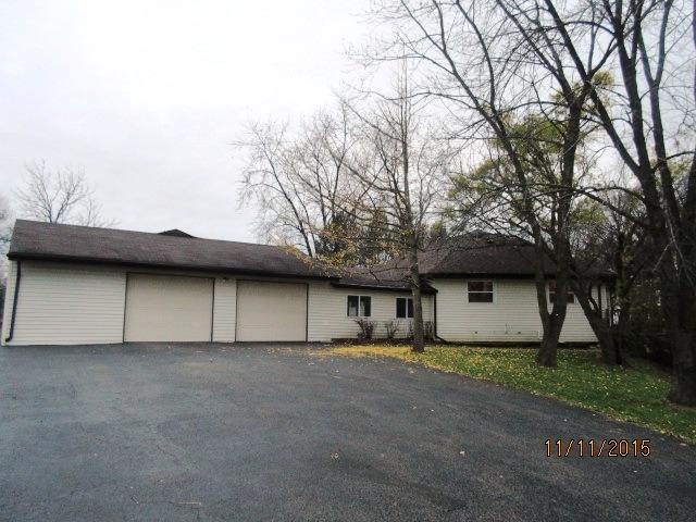 a house with trees in front of it
