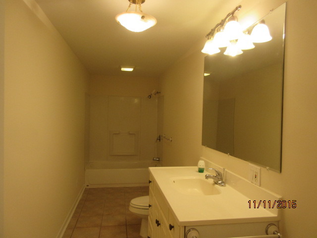 9N052 Corron Road Elgin, IL 60124 - Photo 6 of 19 a bathroom with a sink a toilet and shower