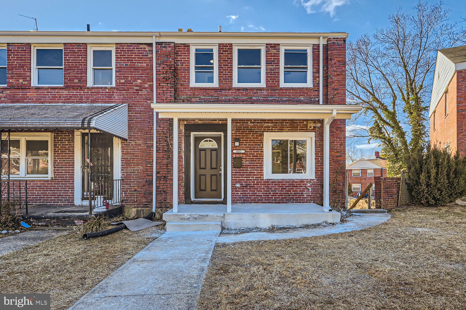 801 Bradhurst Road Baltimore, MD 21212 - Photo 1 of 26 a view of a brick house with large windows