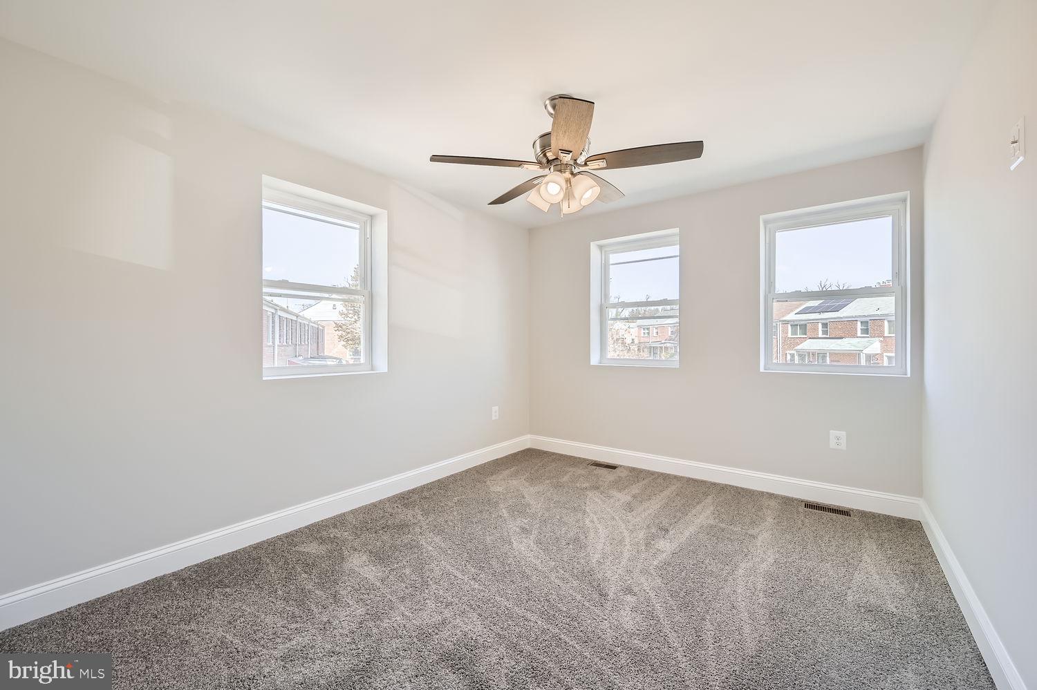 801 Bradhurst Road Baltimore, MD 21212 - Photo 13 of 26 a view of an empty room with a window