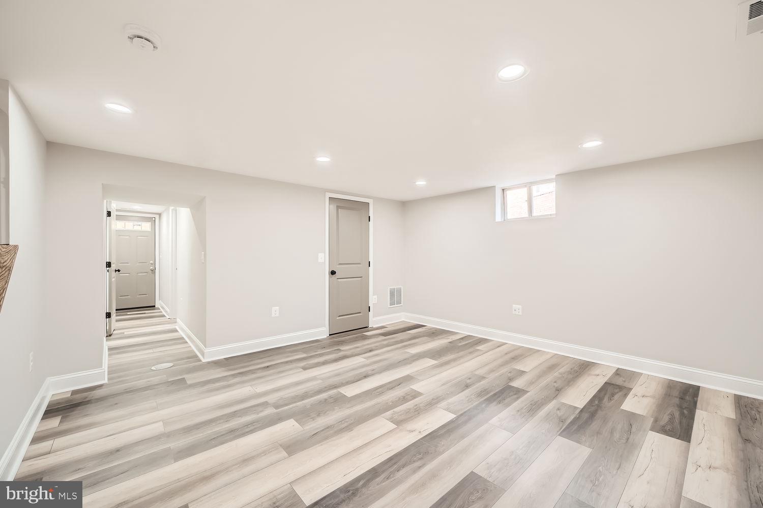 801 Bradhurst Road Baltimore, MD 21212 - Photo 21 of 26 a view of a livingroom with wooden floor