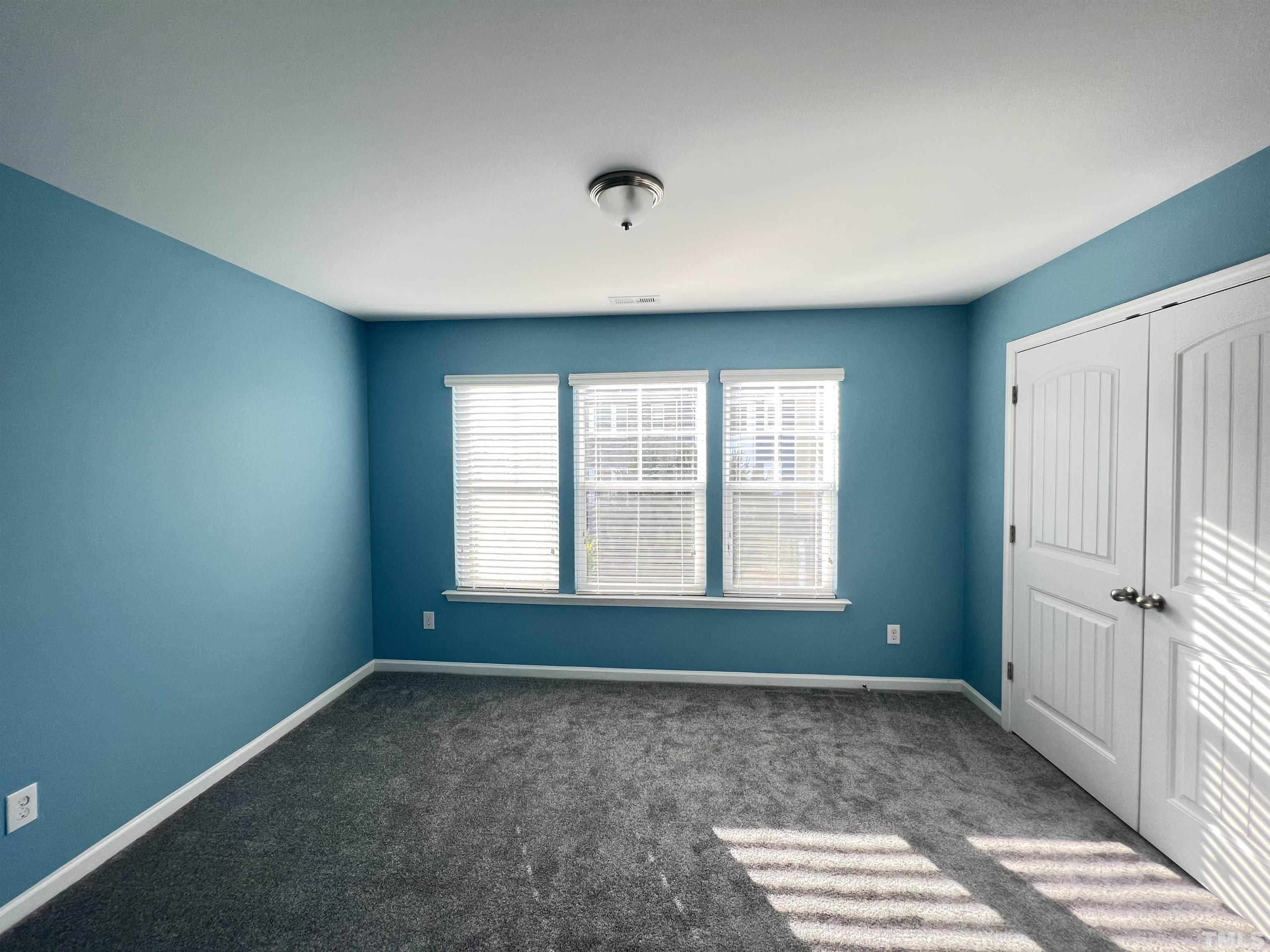 3012 Summerhouse Road Cary, NC 27519 - Photo 15 of 26 an empty room with a window