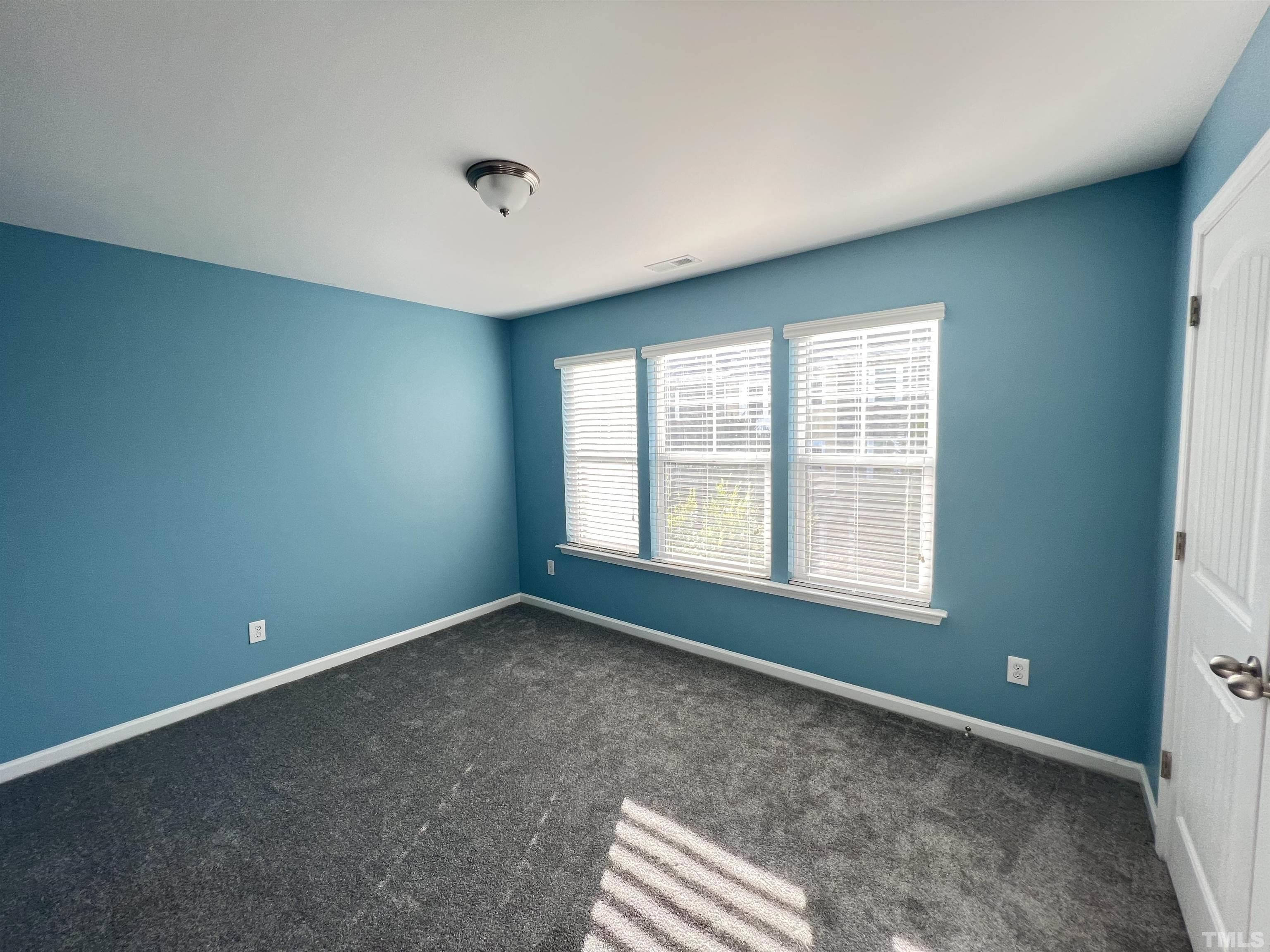 3012 Summerhouse Road Cary, NC 27519 - Photo 16 of 26 an empty room with a window