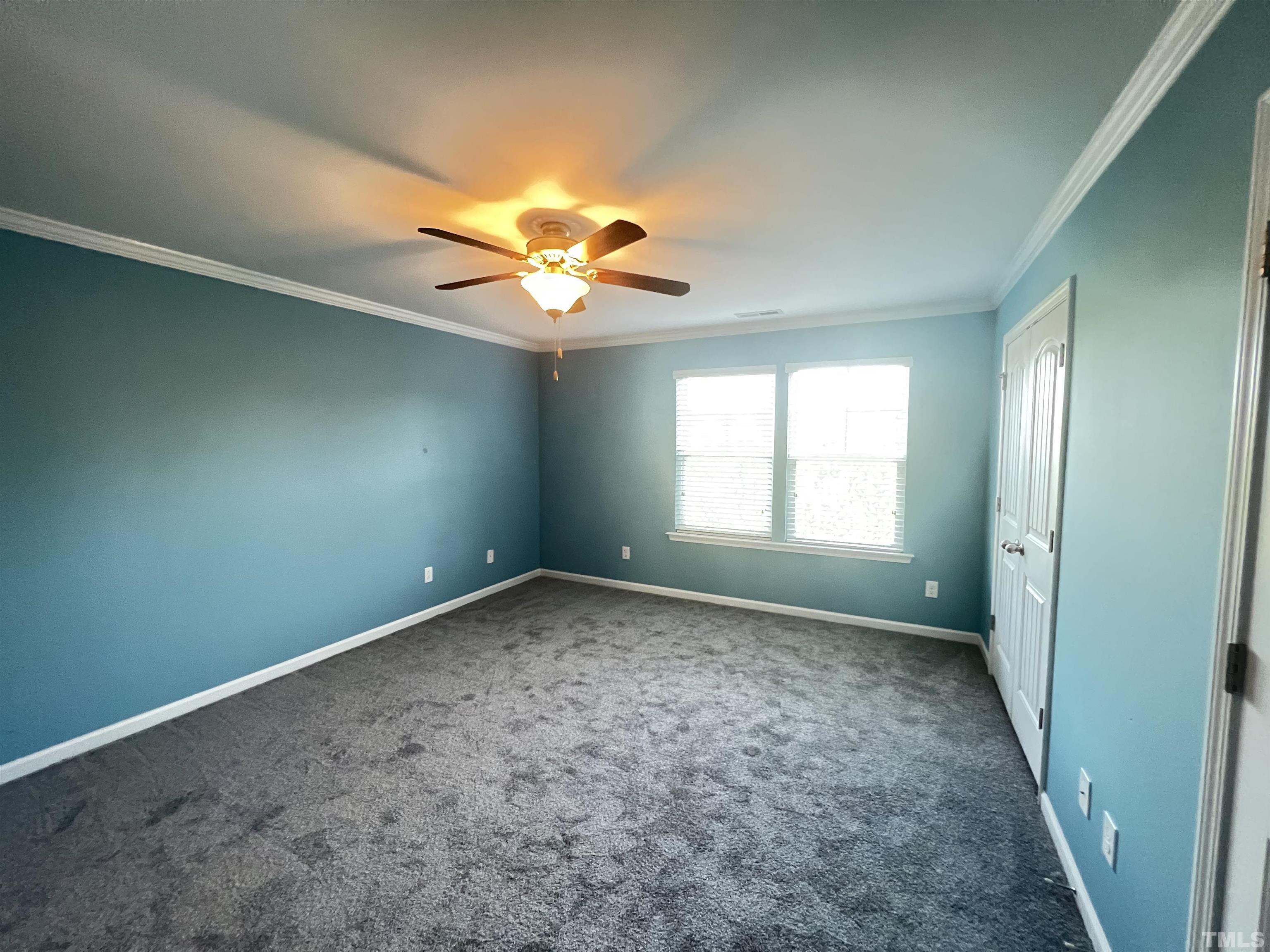 3012 Summerhouse Road Cary, NC 27519 - Photo 18 of 26 a view of an empty room with a window