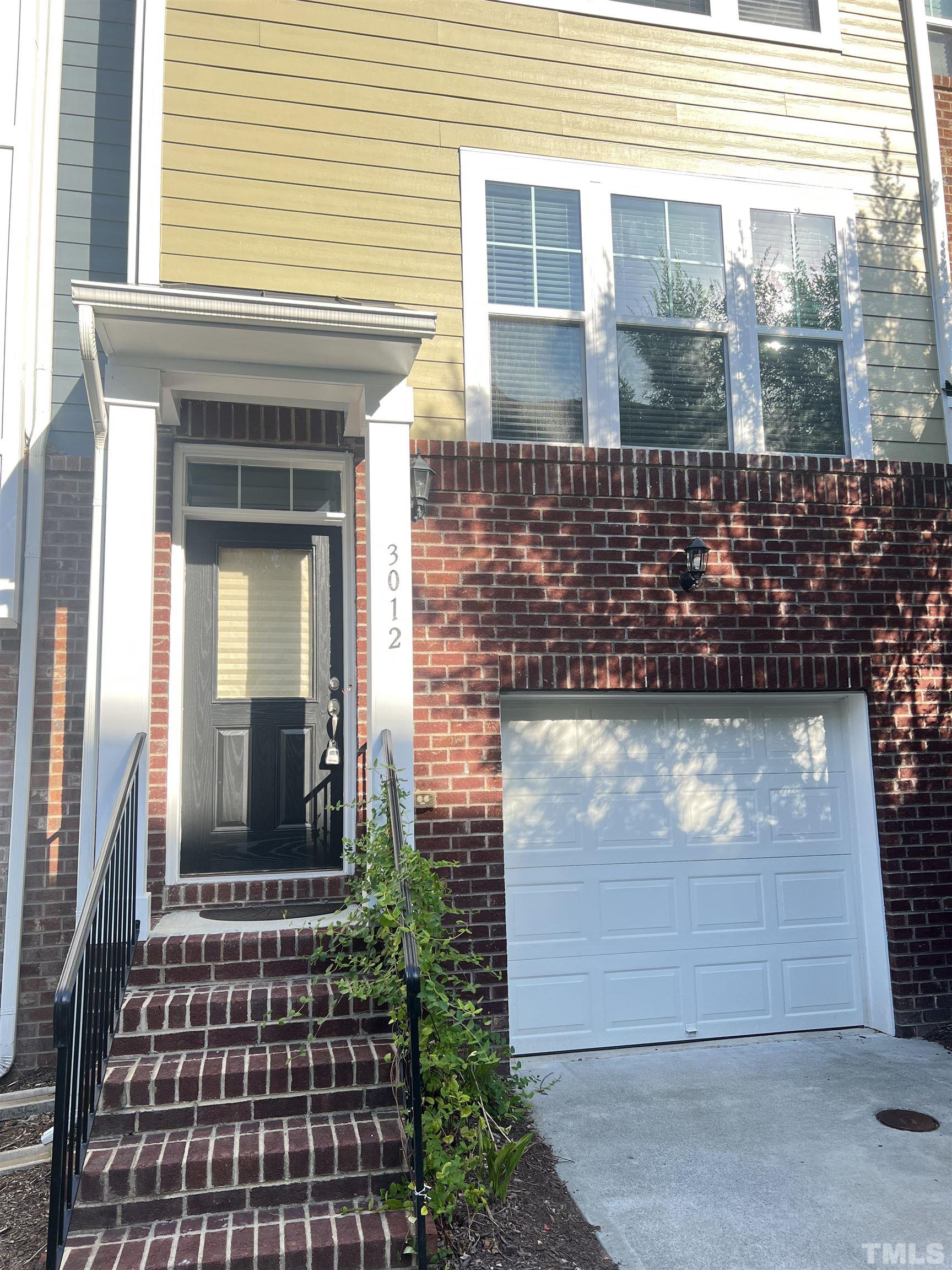 3012 Summerhouse Road Cary, NC 27519 - Photo 2 of 26 a front view of a house