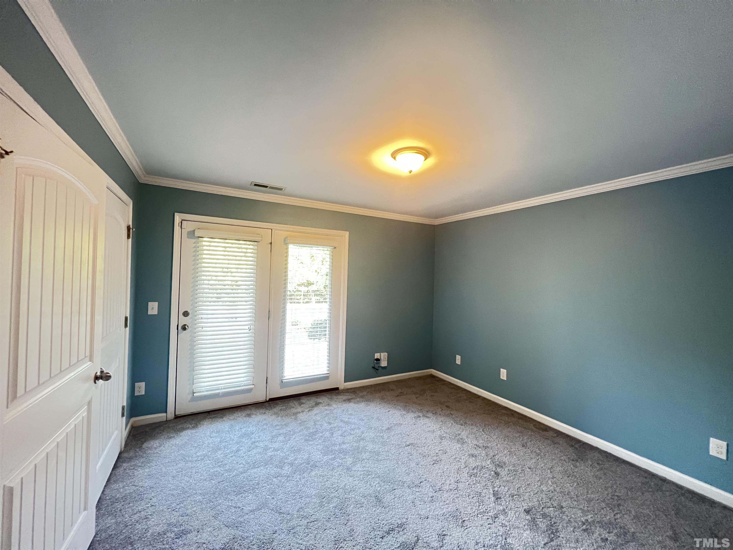 3012 Summerhouse Road Cary, NC 27519 - Photo 21 of 26 an empty room with windows