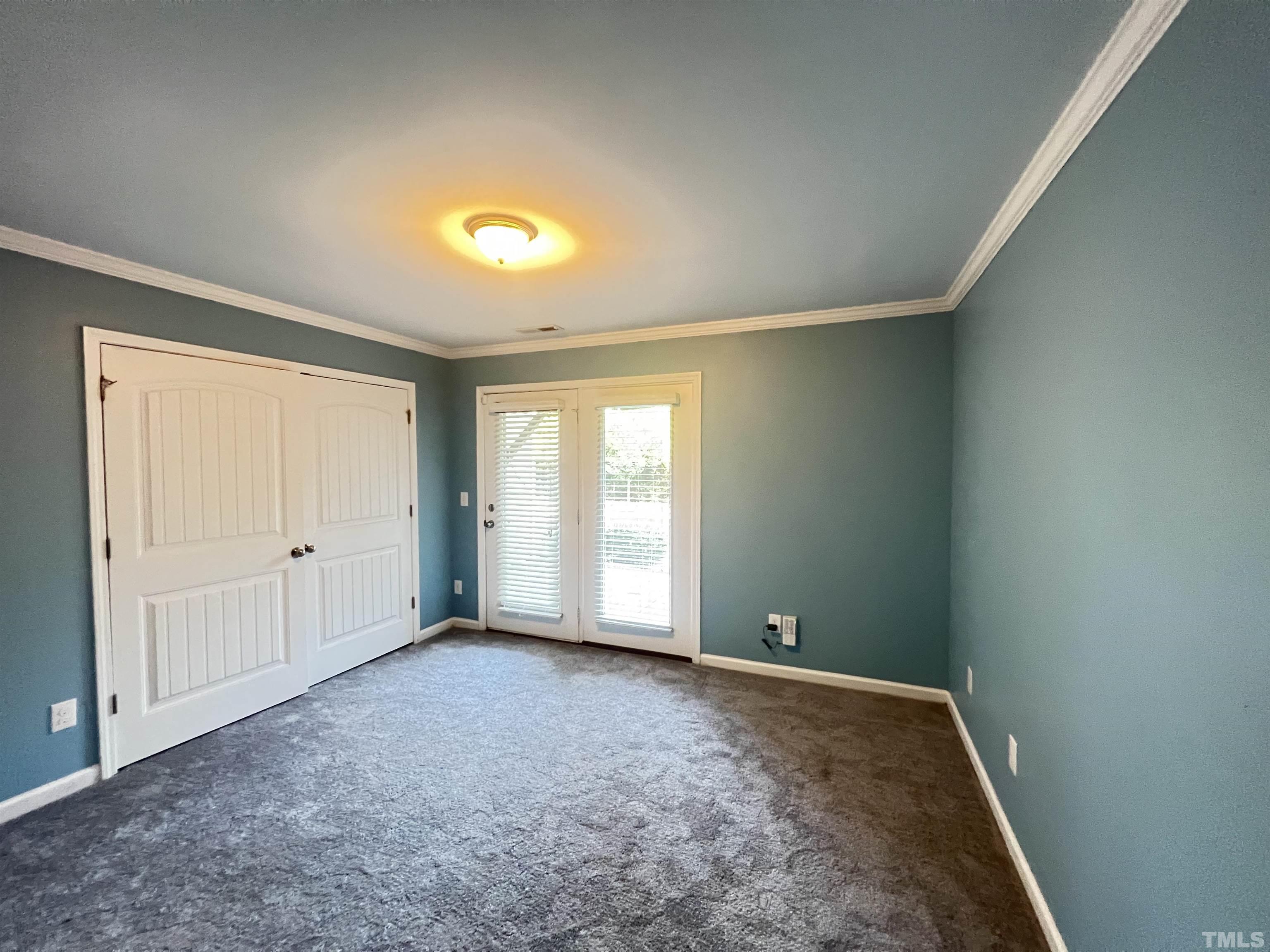 3012 Summerhouse Road Cary, NC 27519 - Photo 22 of 26 a view of an empty room with a window