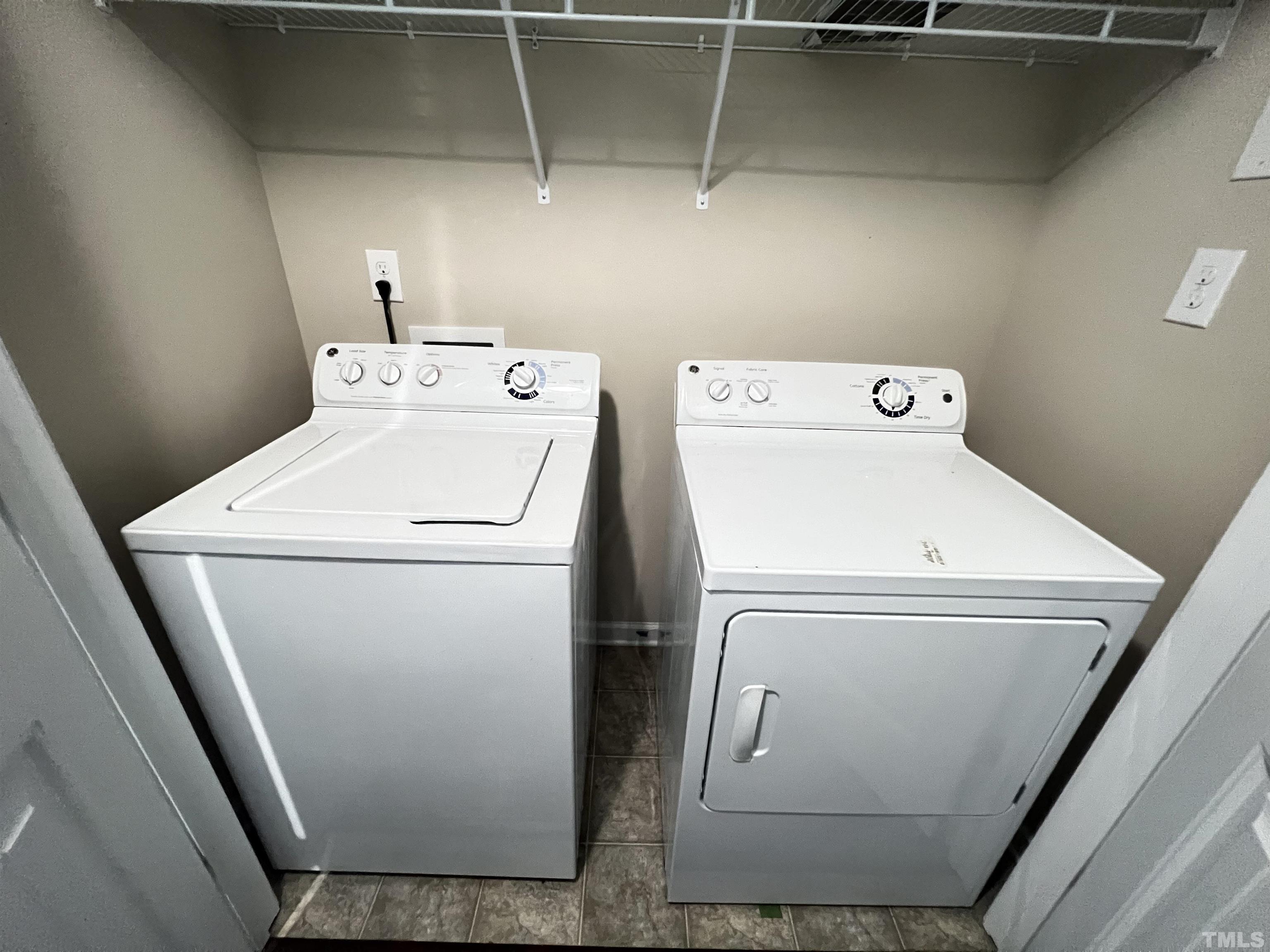 3012 Summerhouse Road Cary, NC 27519 - Photo 24 of 26 a utility room with dryer and washer