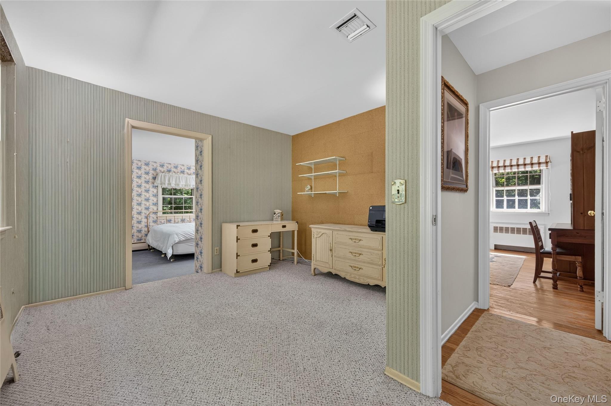 325 Birch Hill Road Locust Valley, NY 11560 - Photo 13 of 18 Sitting Room leading to Bedroom