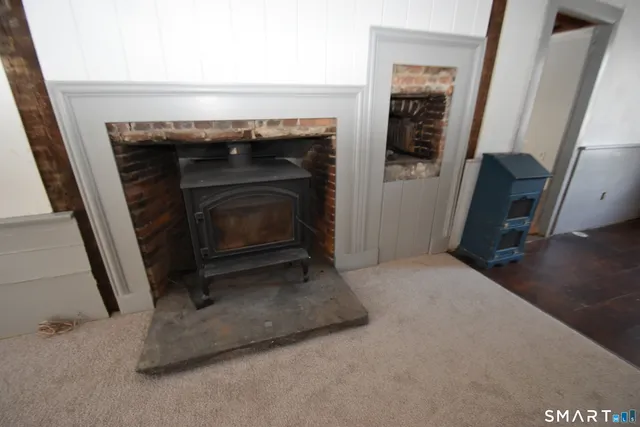 a living room with a fireplace