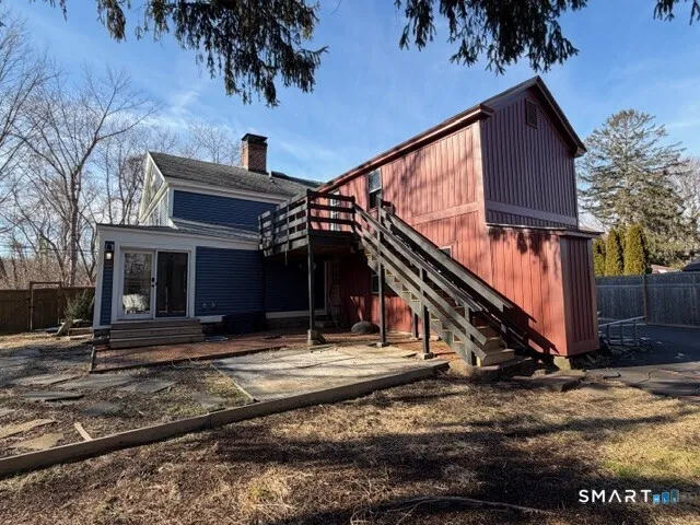 a view of a house with a small yard