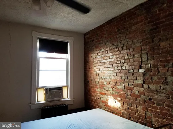 a view of empty room with windows