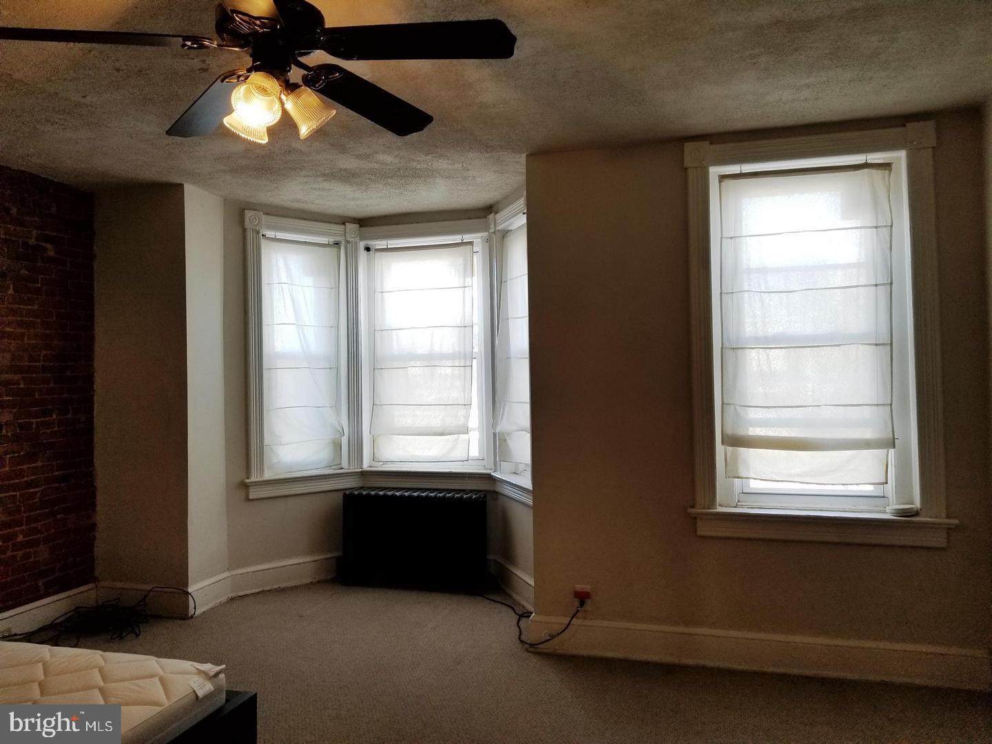 1377 F Street Northeast Washington, DC 20002 - Photo 8 of 13 a view of an empty room with a window