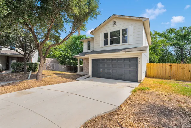 a front view of house with yard