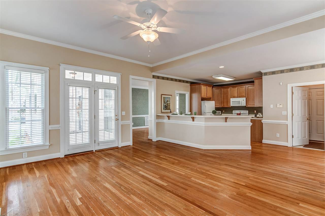 2401 Carruthers Court Raleigh, NC 27615 - Photo 7 of 25 Doors from Living Room to Front Porch