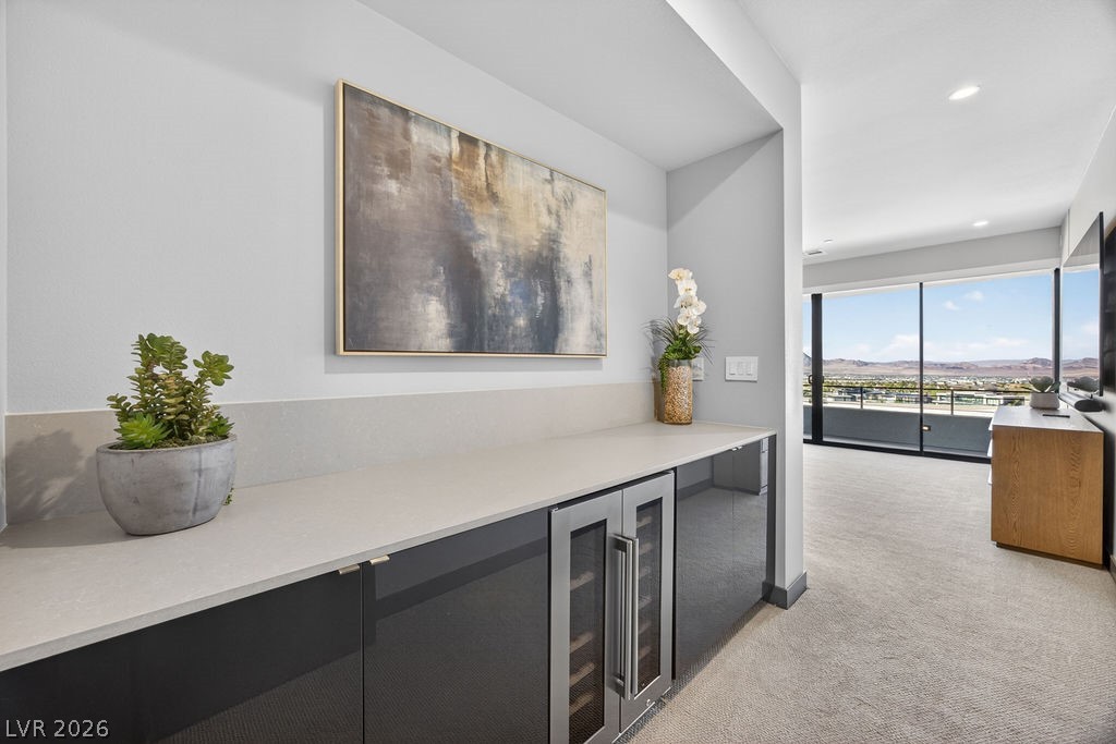 1456 Solitude Ridge Drive Henderson, NV 89012 - Photo 54 of 94 Primary Bedroom with Beverage Fridge & Balcony, Upstairs