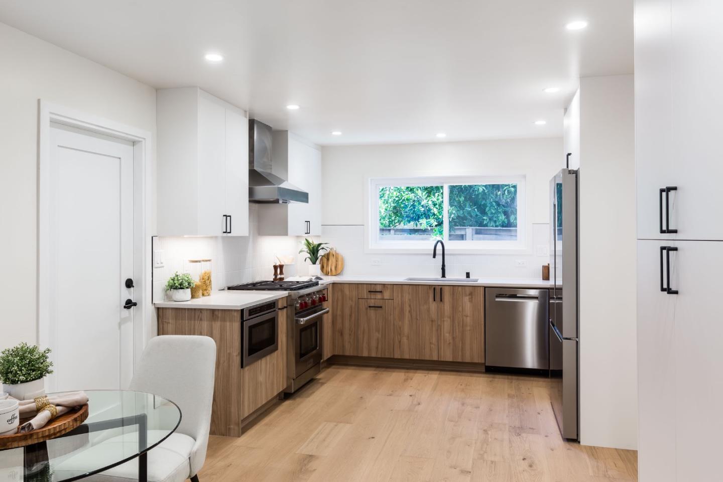 2498 Raleigh Drive San Jose, CA 95124 - Photo 5 of 17 a kitchen with stainless steel appliances granite countertop a sink stove and refrigerator