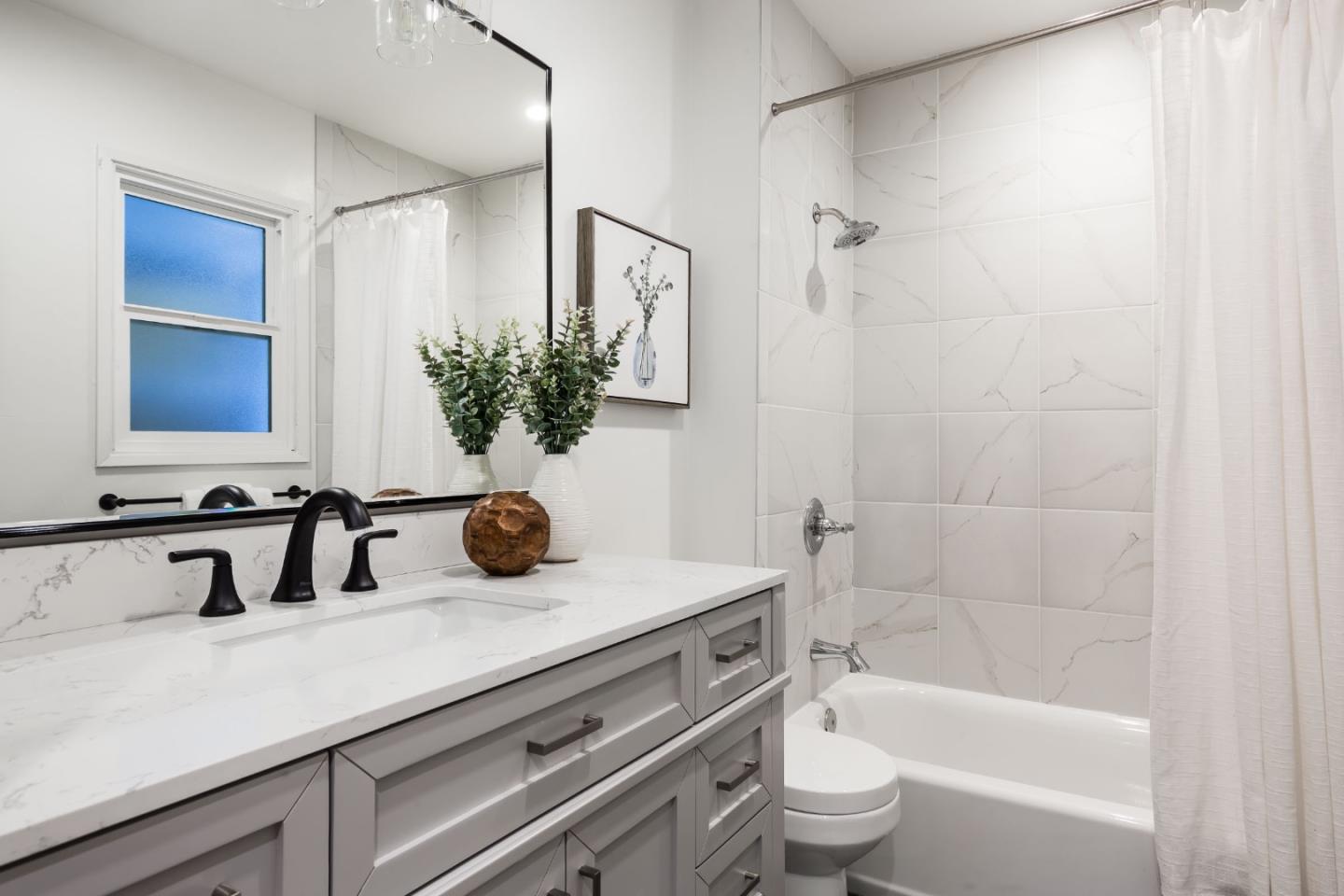 2498 Raleigh Drive San Jose, CA 95124 - Photo 6 of 17 a bathroom with a tub a sink and a large mirror