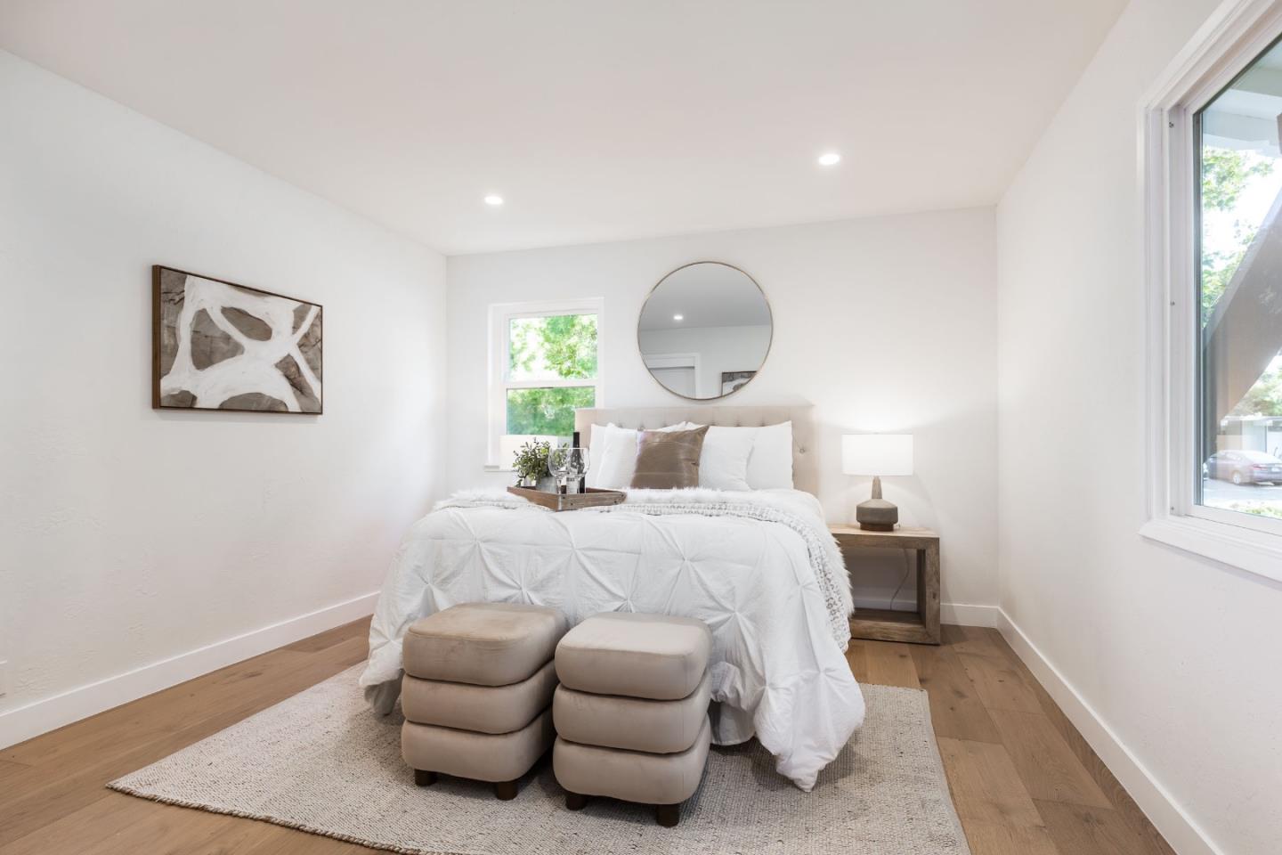 2498 Raleigh Drive San Jose, CA 95124 - Photo 10 of 17 a bedroom with a bed and wooden floor