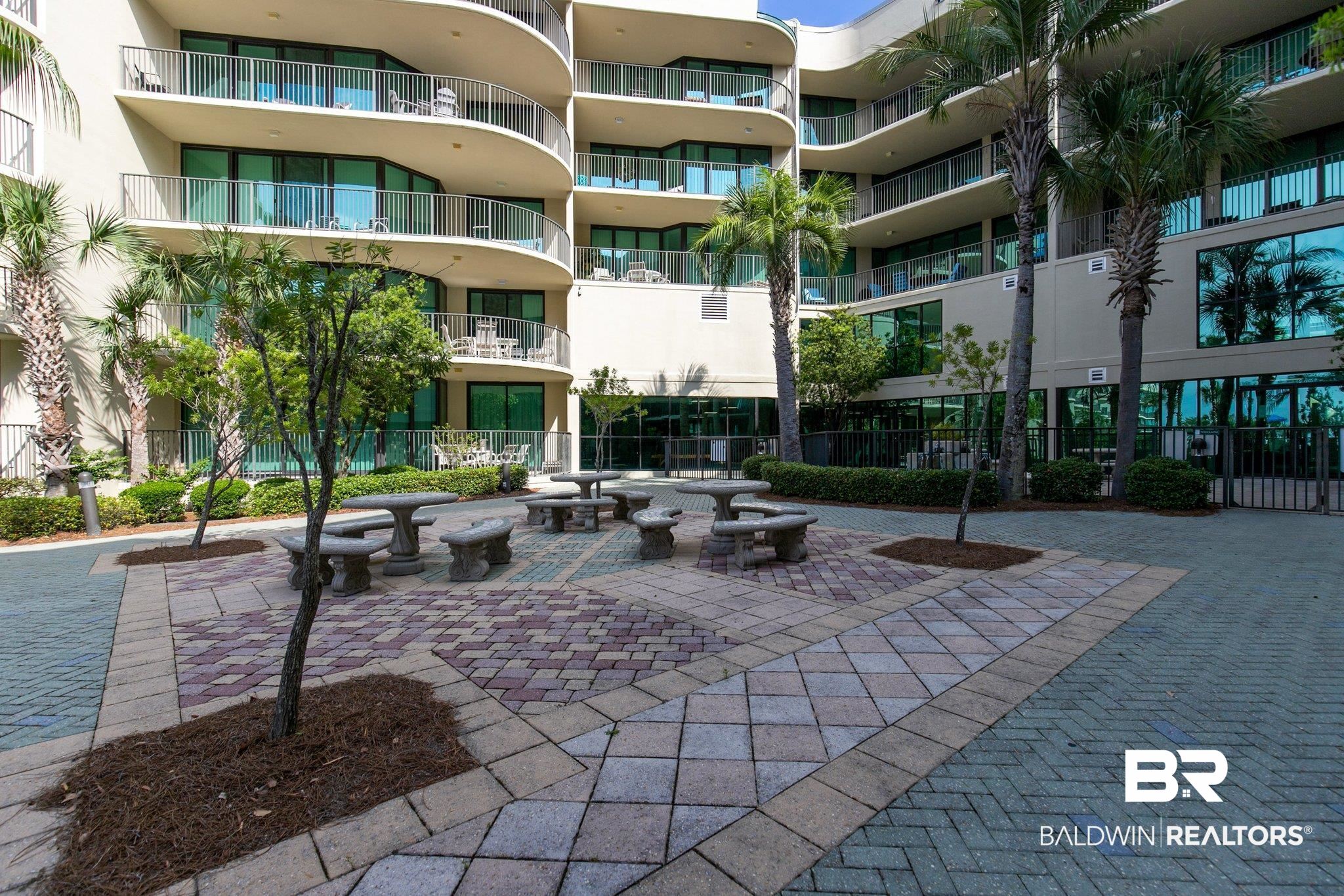 27580 Canal Road, Unit 1423 Orange Beach, AL 36561 - Photo 31 of 34 View of courtyard picnic/lounge area.