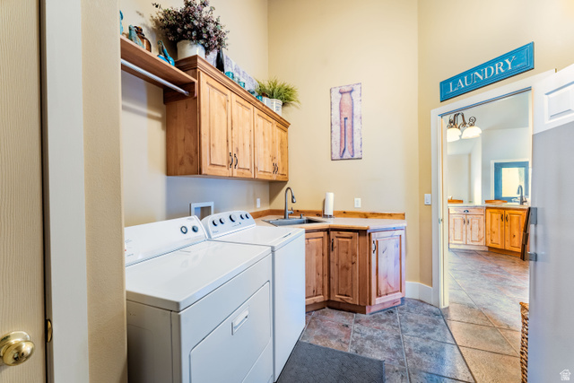 7343 North Sawtooth Cv Road Vernal, UT 84078 - Photo 14 of 64 Laundry area featuring alder cabinetry, a utility sink, and ample countertop space