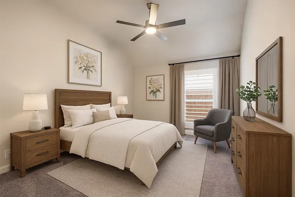 a bedroom with a bed and a couch