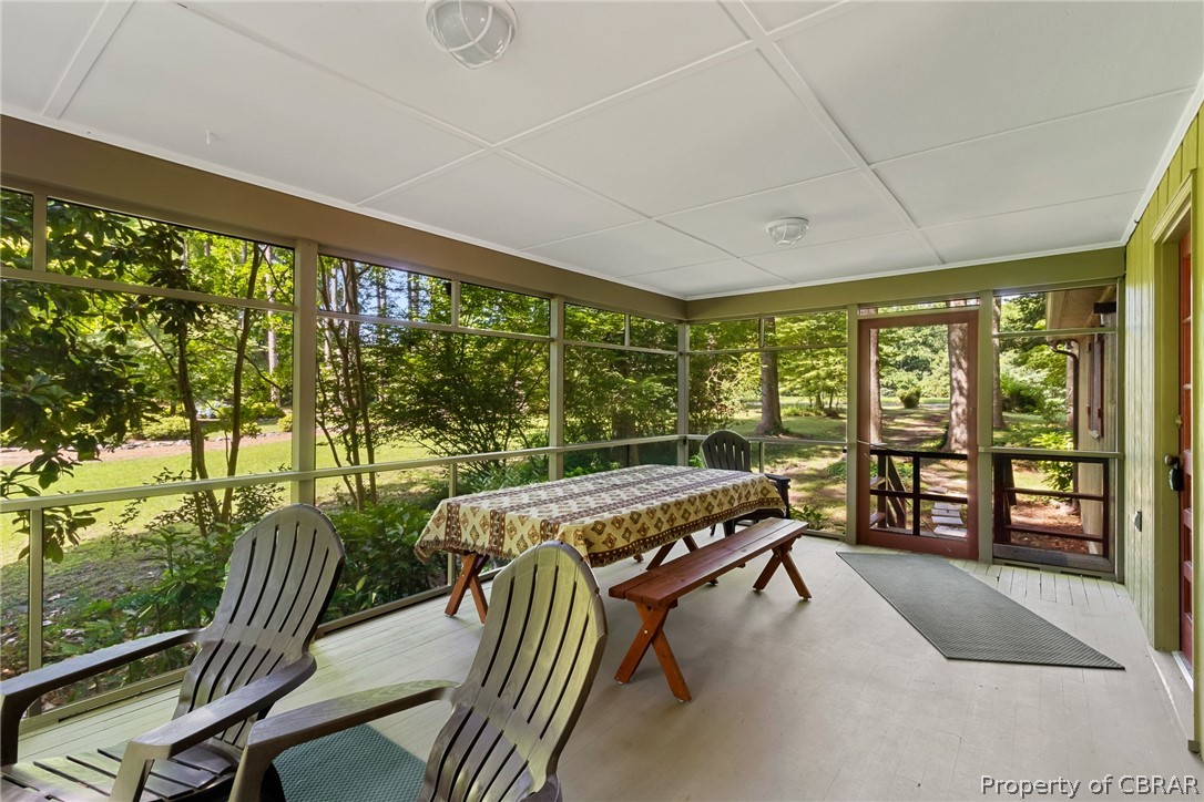 94 Nottingham Drive Reedville, VA 22539 - Photo 5 of 34 Screened porch with water view.