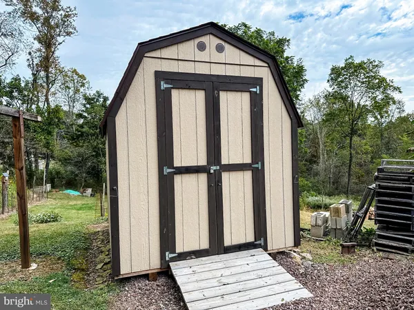 a view of a golf course with a tree
