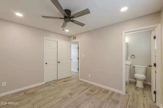 a kitchen with a refrigerator stove and microwave