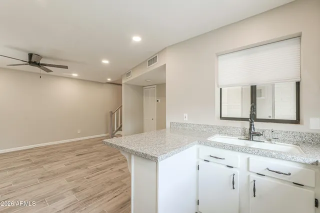 a bathroom with a toilet and a sink