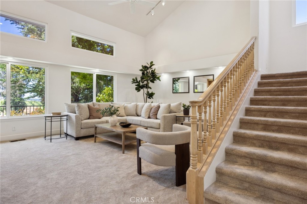 993 Las Palmas Way San Luis Obispo, CA 93401 - Photo 11 of 63 a living room with furniture and a potted plant