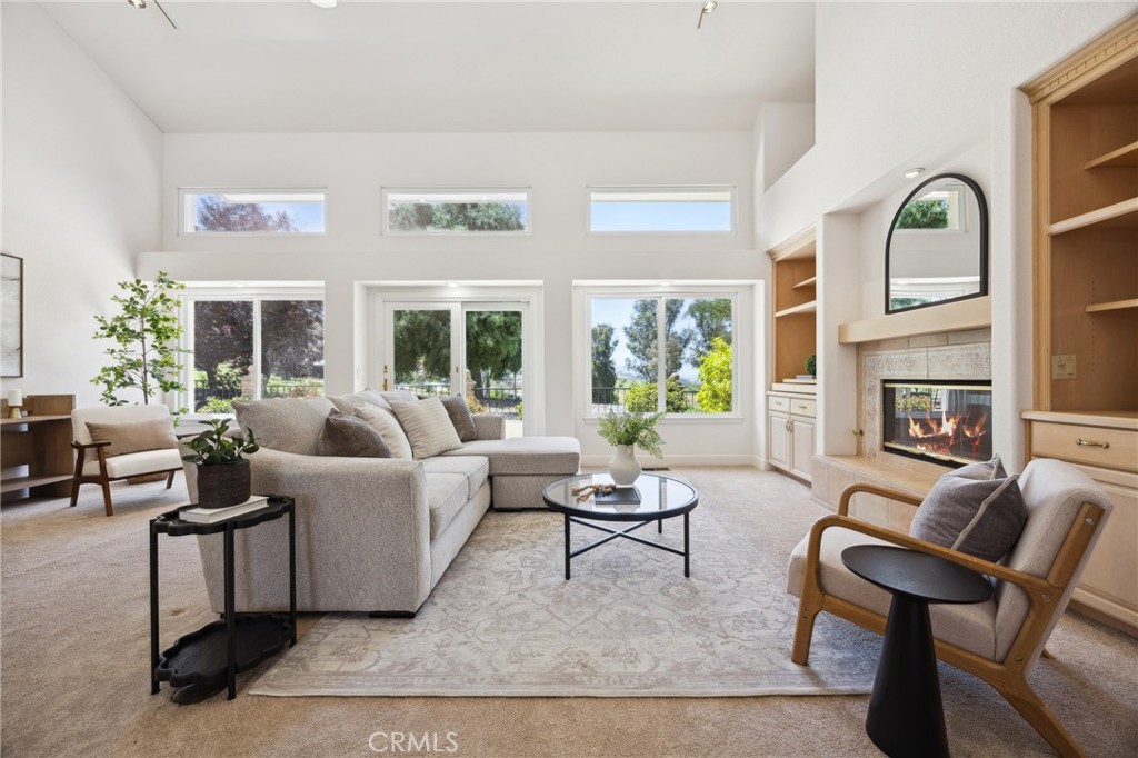 993 Las Palmas Way San Luis Obispo, CA 93401 - Photo 14 of 63 a living room with fireplace furniture and a fireplace