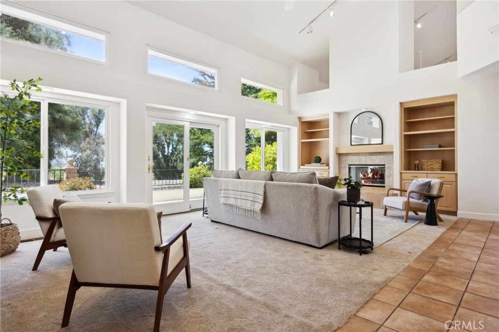 993 Las Palmas Way San Luis Obispo, CA 93401 - Photo 16 of 63 a living room with furniture and a large window