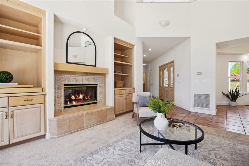 993 Las Palmas Way San Luis Obispo, CA 93401 - Photo 17 of 63 a living room with furniture and a fireplace