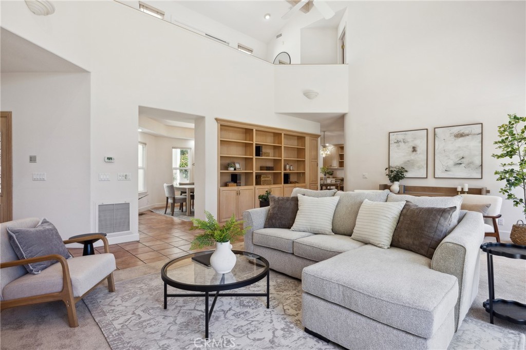 993 Las Palmas Way San Luis Obispo, CA 93401 - Photo 19 of 63 a living room with furniture and glass windows