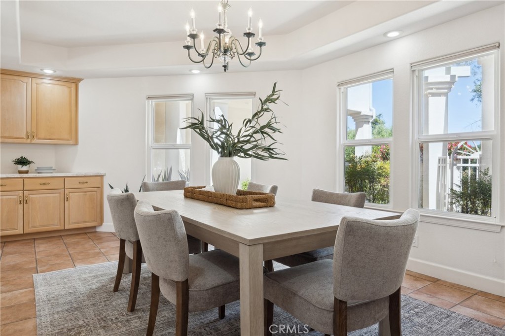 993 Las Palmas Way San Luis Obispo, CA 93401 - Photo 21 of 63 a view of a dining room with furniture window and wooden floor