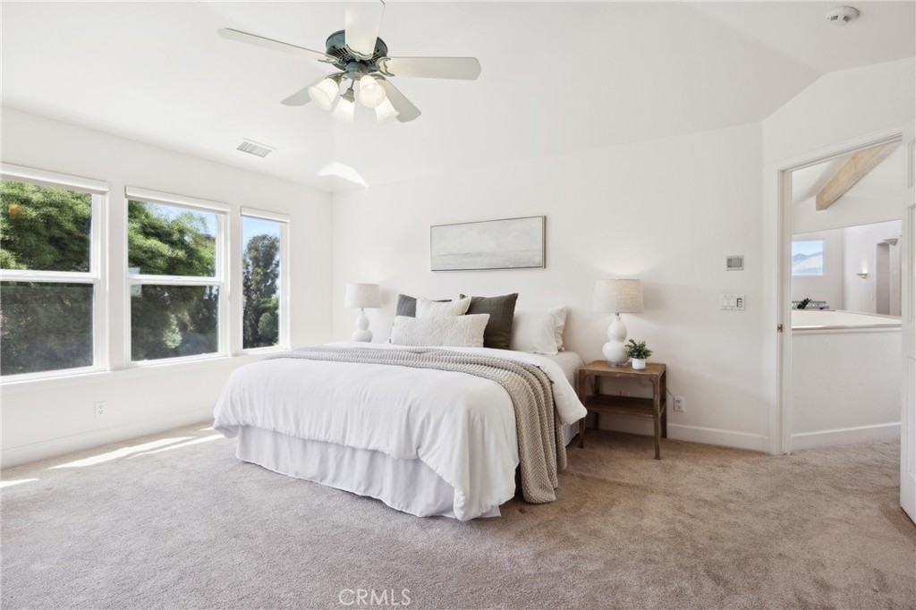 993 Las Palmas Way San Luis Obispo, CA 93401 - Photo 32 of 63 a bedroom with bed and a large window