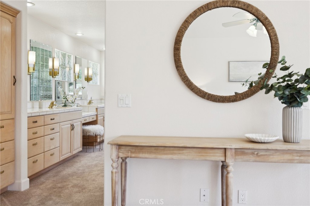 993 Las Palmas Way San Luis Obispo, CA 93401 - Photo 33 of 63 a bathroom with a sink and a mirror