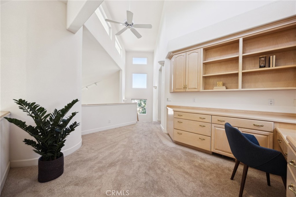 993 Las Palmas Way San Luis Obispo, CA 93401 - Photo 42 of 63 a living room with furniture and a potted plant