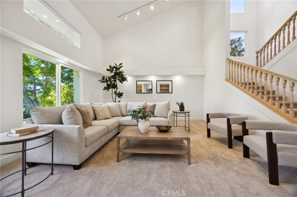 993 Las Palmas Way San Luis Obispo, CA 93401 - Photo 10 of 63 a living room with furniture and a potted plant