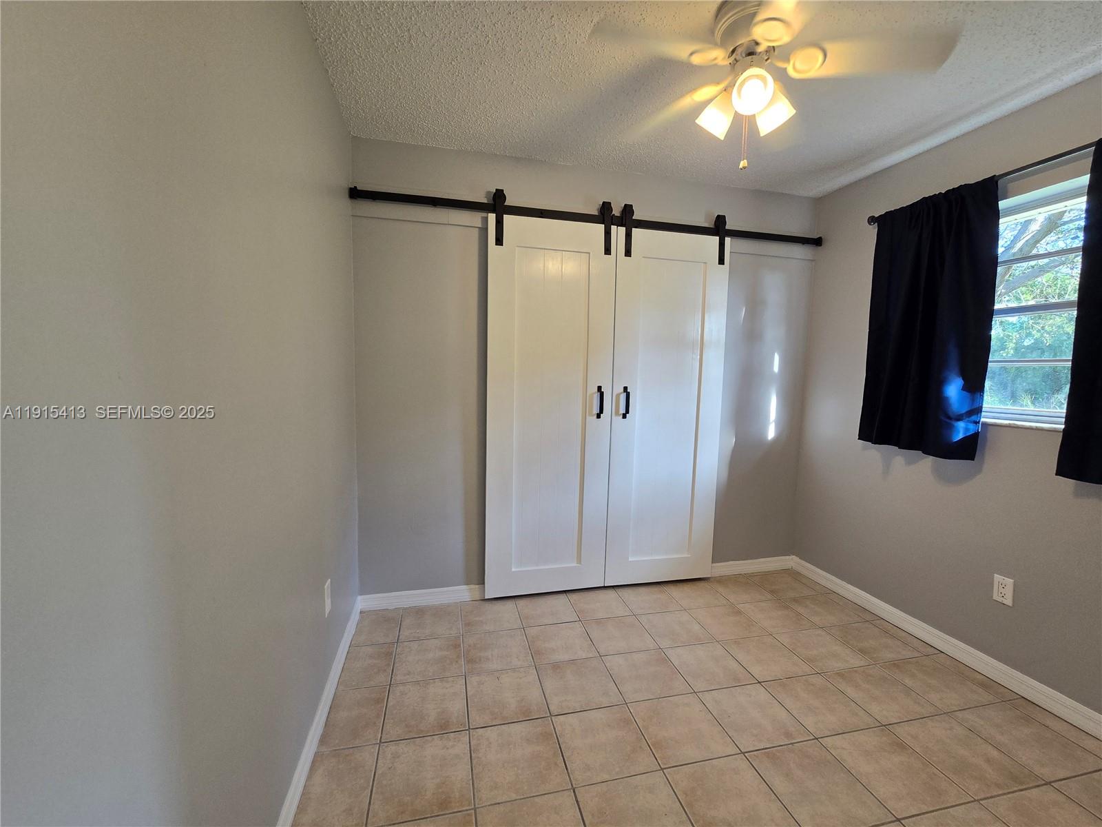4550 Southeast Salvatori Road Stuart, FL 34997 - Photo 12 of 13 a view of an empty room