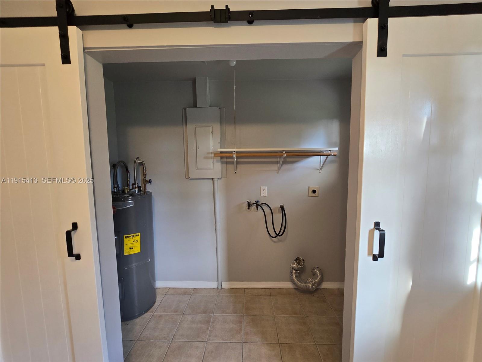 4550 Southeast Salvatori Road Stuart, FL 34997 - Photo 13 of 13 a view of water heater room