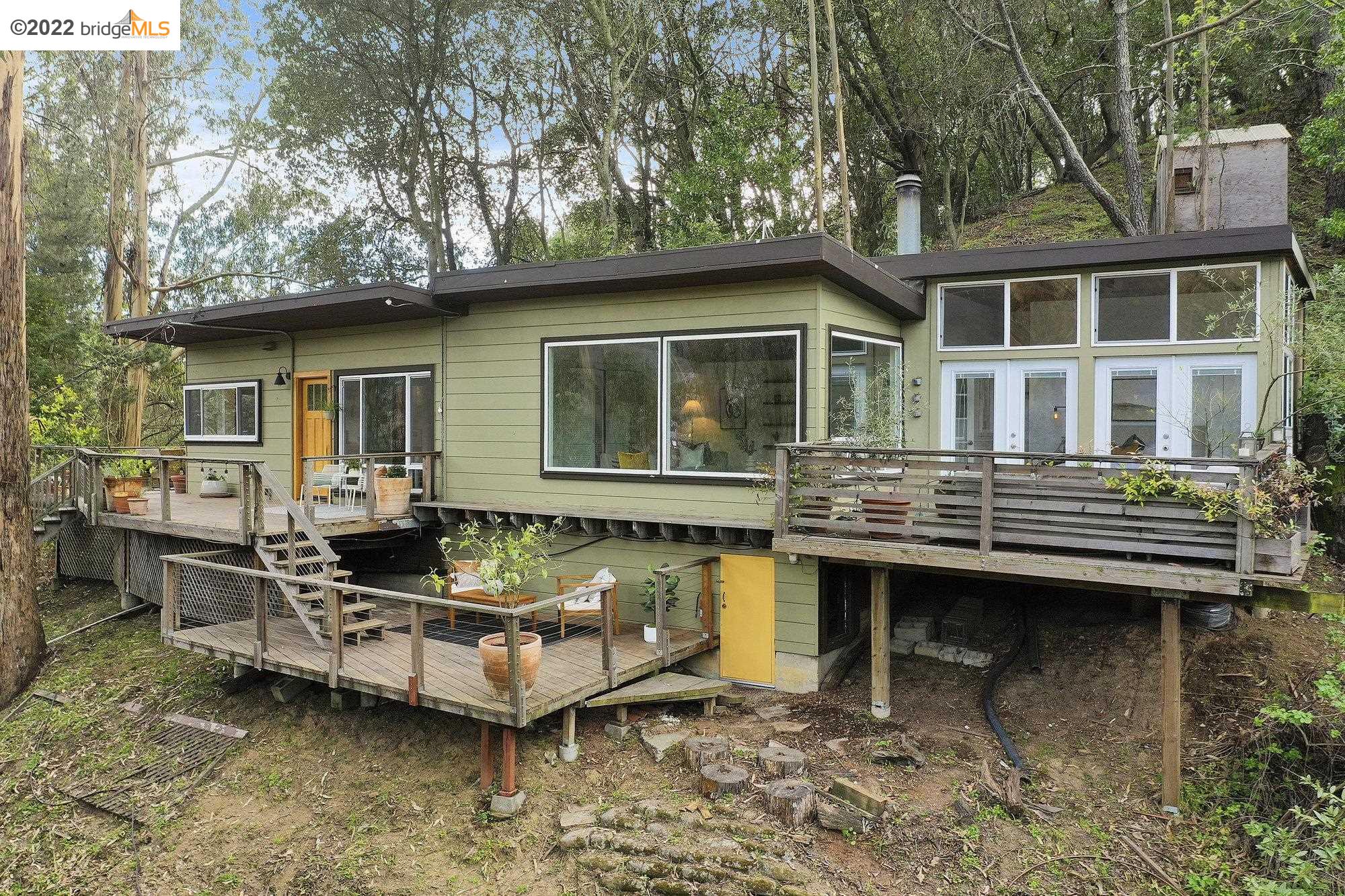 6441 Valley View Road Oakland, CA 94611 - Photo 1 of 1 a view of a house with a large window and sitting area
