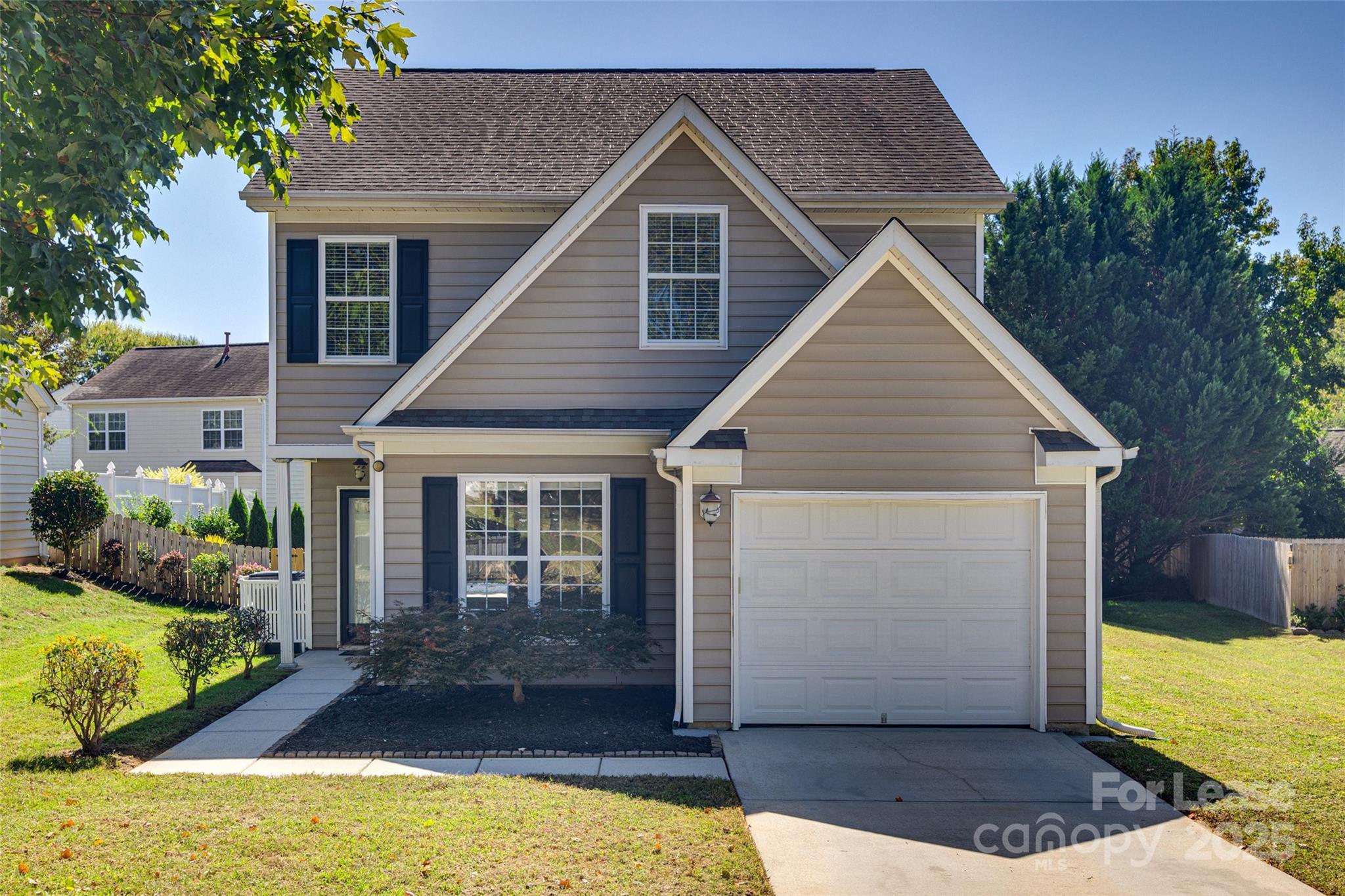 2535 Fossil Stone Lane Fort Mill, SC 29708 - Photo 1 of 43 a view of a yard in front of house