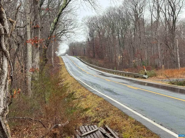 a view of backyard with green space