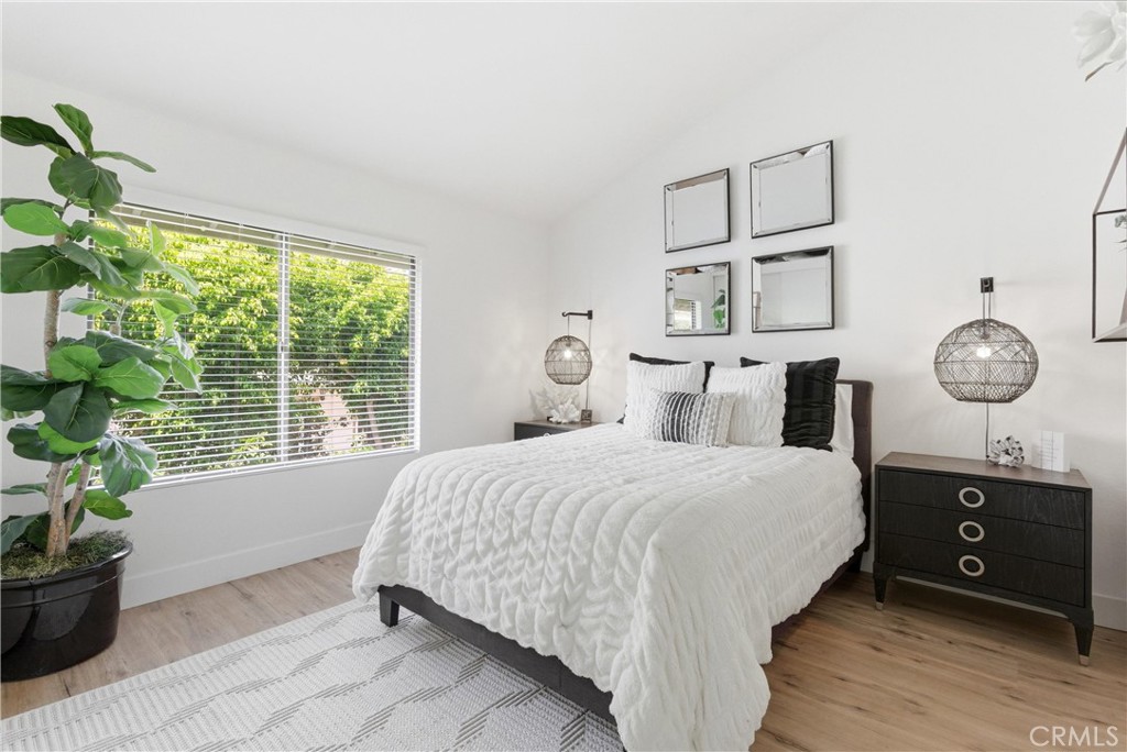 23281 Atlantis Way Dana Point, CA 92629 - Photo 47 of 81 a bedroom with a bed and a window