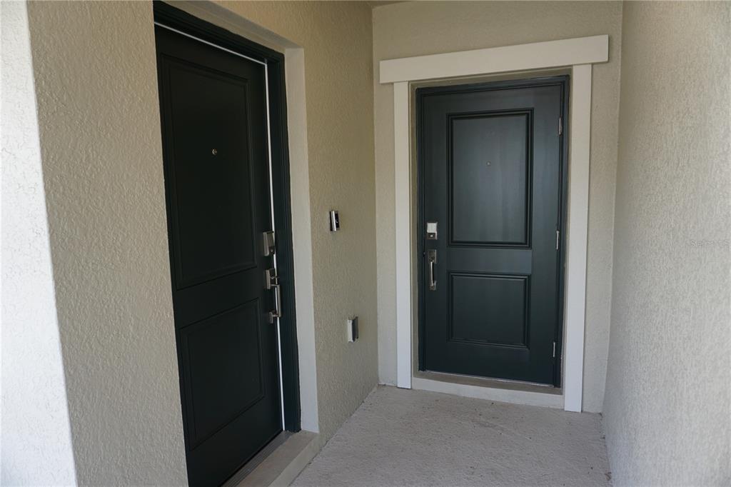 5704 Stephens Road, Unit 1 St. Cloud, FL 34771 - Photo 3 of 8 a view of an entryway door